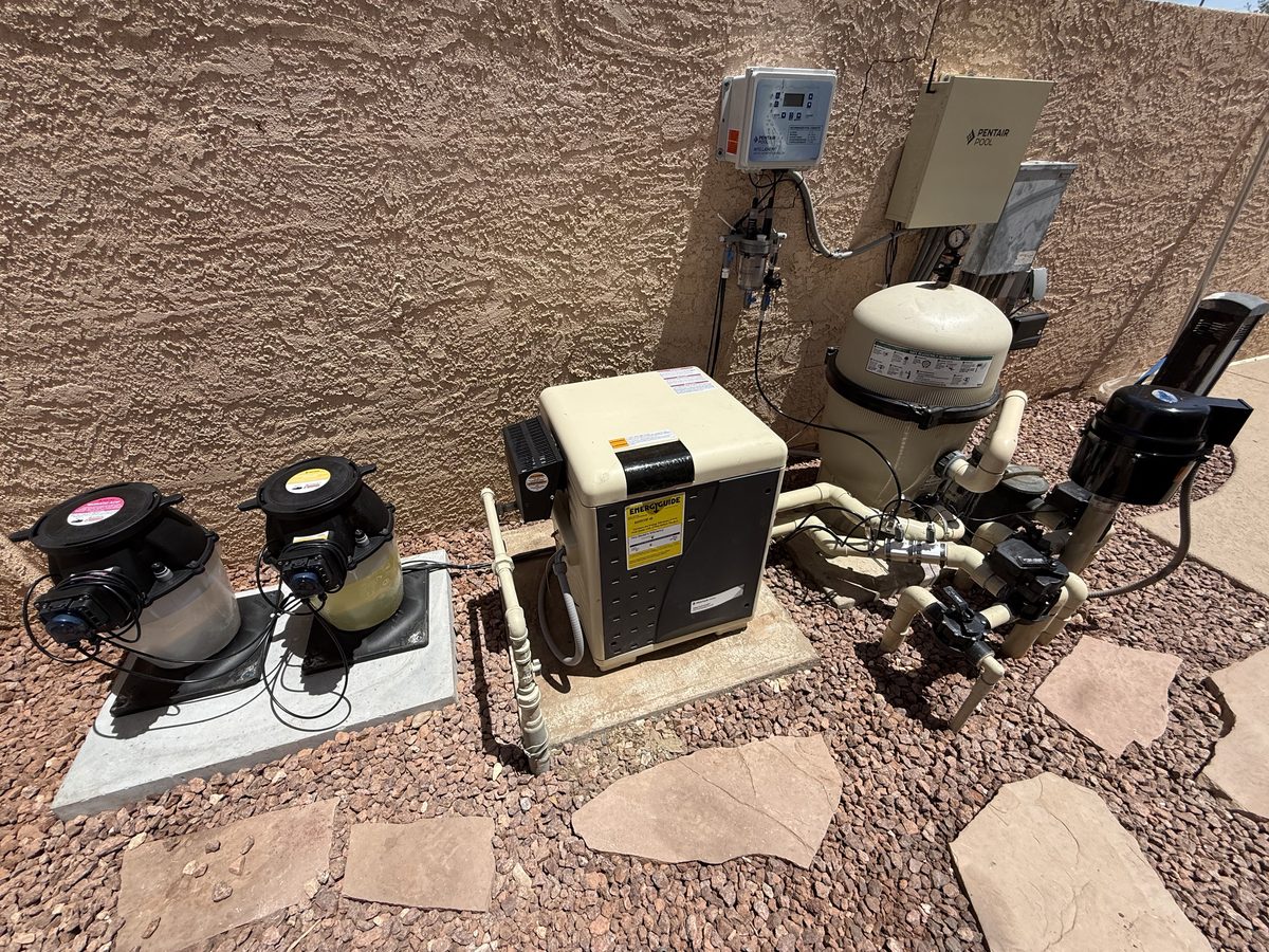 Chemical feeder and filter system installation